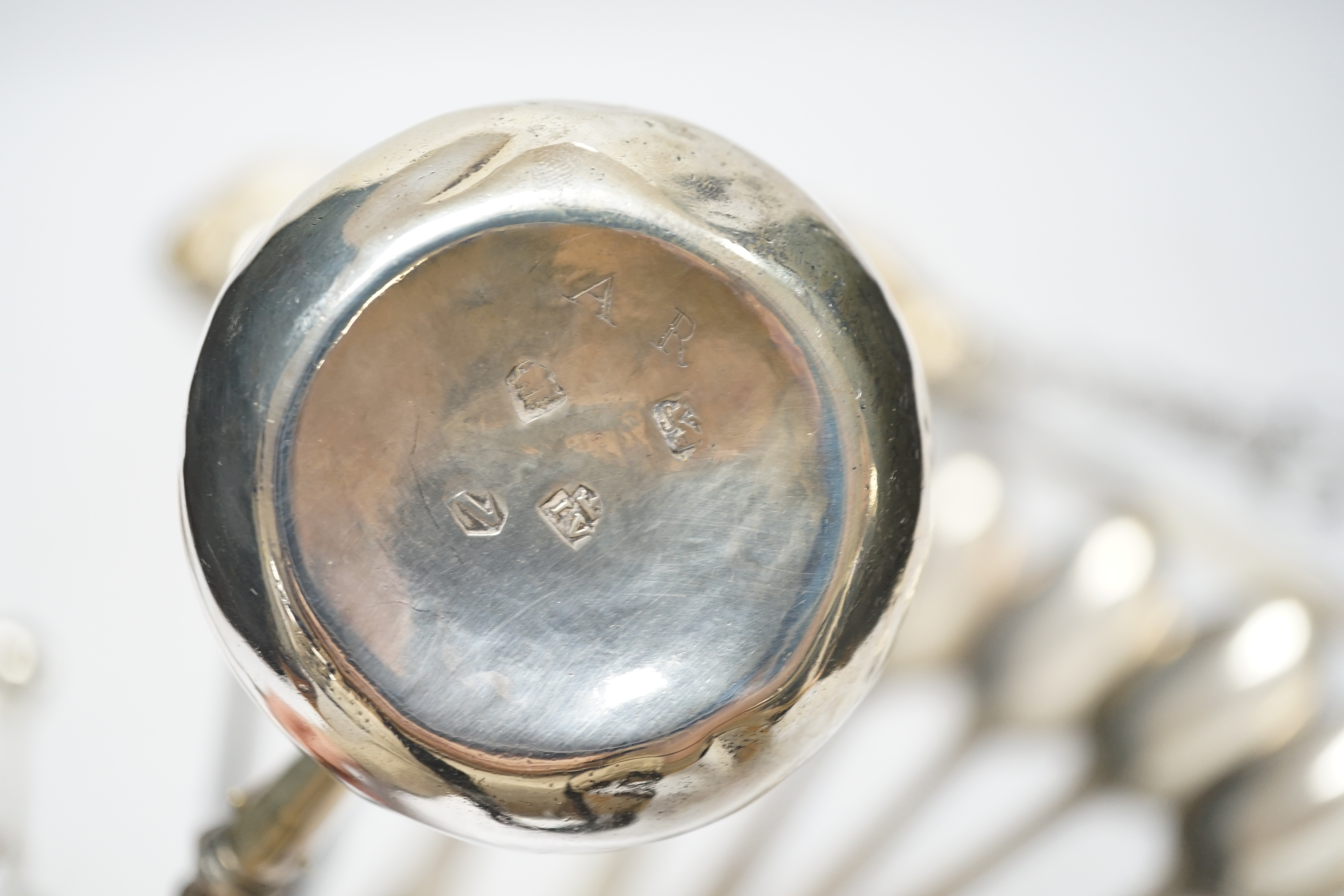 A late William IV silver fiddle pattern basting spoon, London, 1836, seven assorted 19th century silver base mark spoons, a Georgian Scottish dessert spoon, two toddy ladles, A George II brandy ladle, London, 1735, a Geo